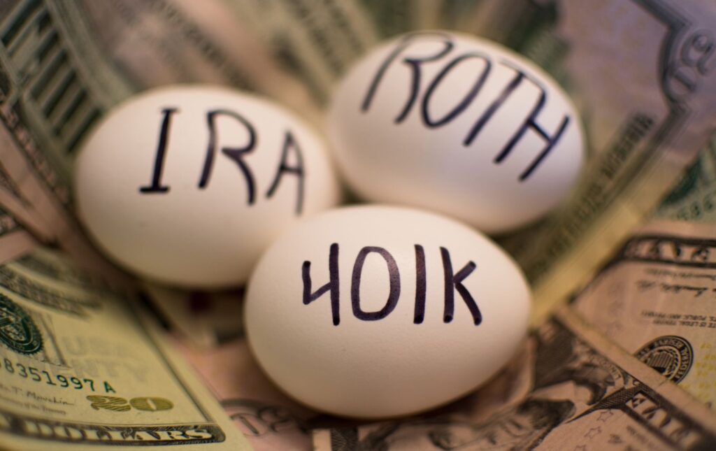 three eggs representative of your retirement money "nest eggs" from your former employer's 401k "IRA," ROTH," and "401k."